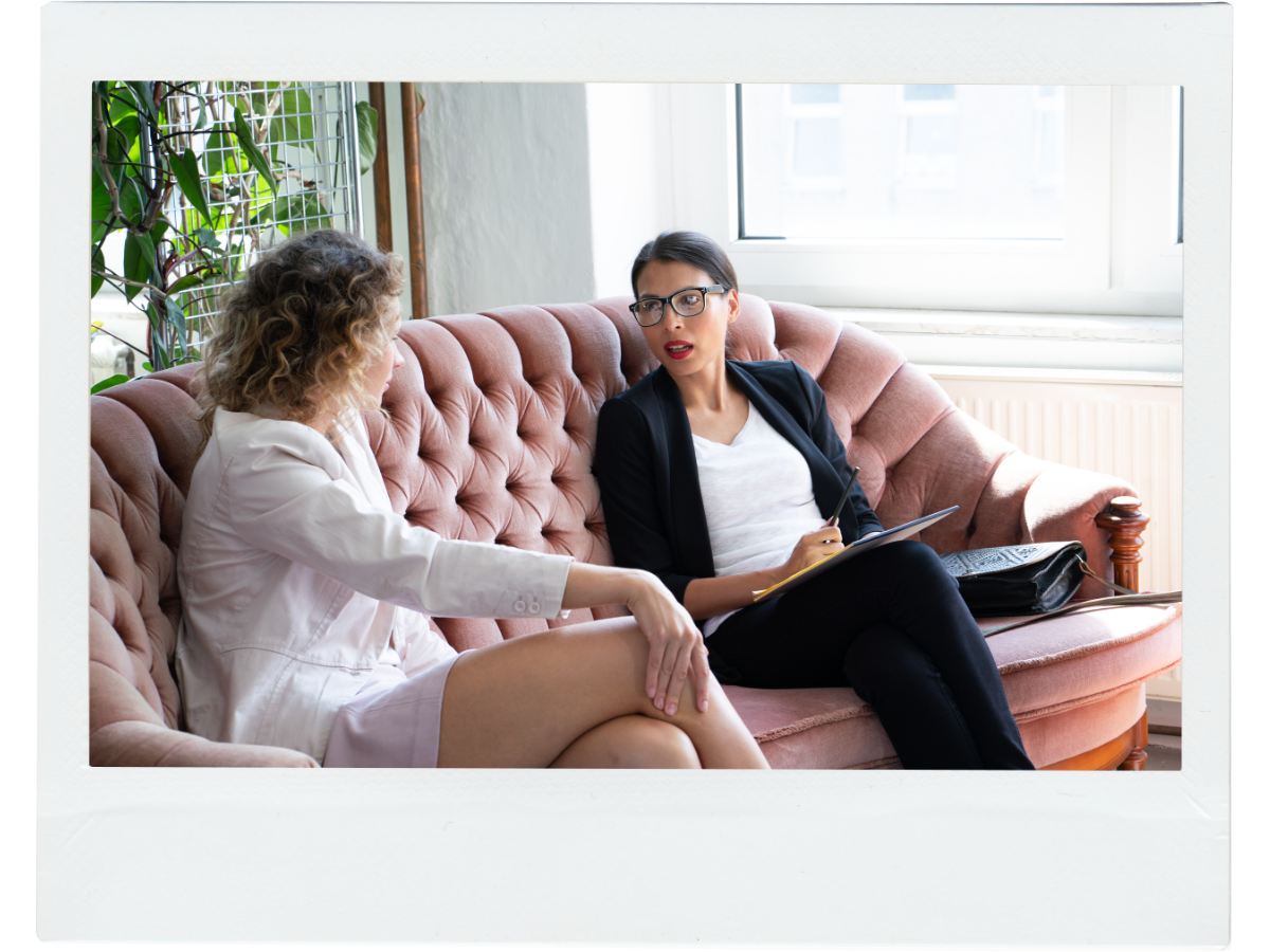 Female executive coach talking with a client